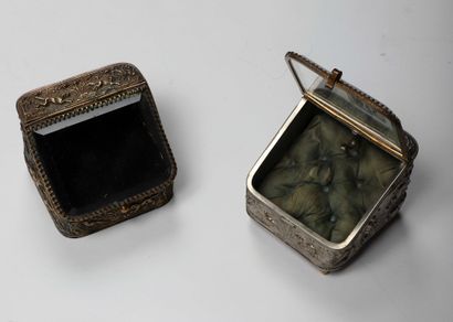 Two metal watch holders embossed with hunting...