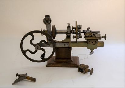 Iron and brass chisel lathe with wooden base...