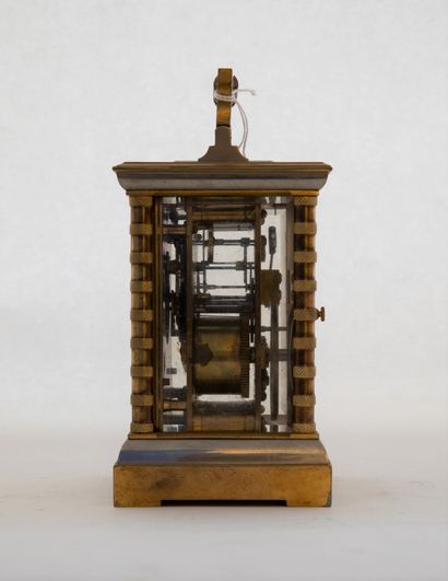 null Bronze and gilt brass travel clock with passage striking and repeater, the movement...