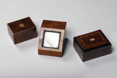 null Three watch holders in wood of fine species, two rectangular closed. One with...