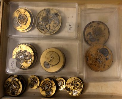 null Twenty-two watch movements, mostly from the 18th century and with dials.