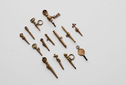 Quinze clés en or (Breguet, cylindres, croix),...