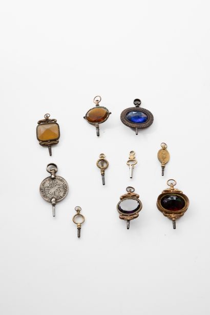 Ten various keys (set with stone, coin).