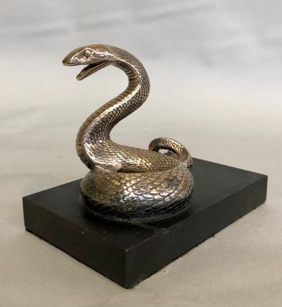 null CHRISTOFLE:

serpent dressé en métal argenté, reposant sur une base rectangulaire...