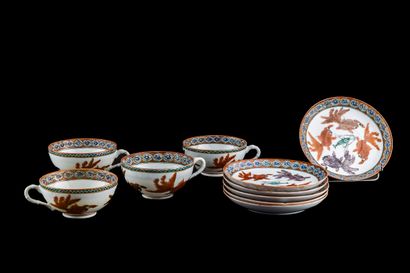 Set of four cups and six saucers, decorated...