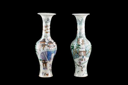 null Pair of high necked vases, in Nanking stoneware, with polychrome decoration...