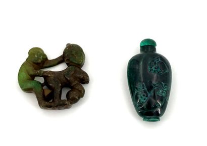 null Lot including a malachite snuff bottle decorated with rabbits nibbling carrots;...