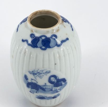null Small ovoid vase in blue-white porcelain decorated with children

China, 19th...