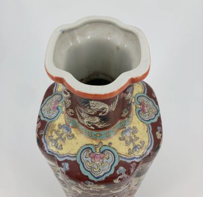 null Four-lobed baluster vase in porcelain and enamels of the pink family, decorated...