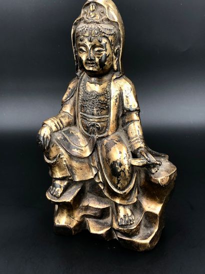null Chine, fin de l’époque Qing,

Sujet en bronze doré représentant une guanyin

H....