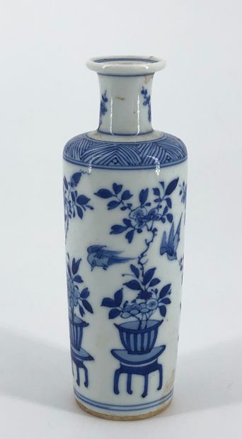 null White porcelain scroll vase with blue underglaze decoration of flowering planters,...
