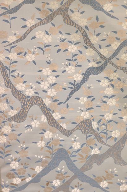 null Sky blue silk panel embroidered with prunus in bloom in a stylized mountain...