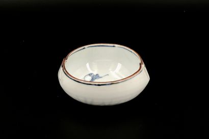 null Lot of five objects including a small blue-white porcelain bowl, with pinched...