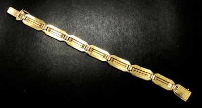 null Articulated bracelet in yellow and white gold 750 thousandths the links of geometrical...