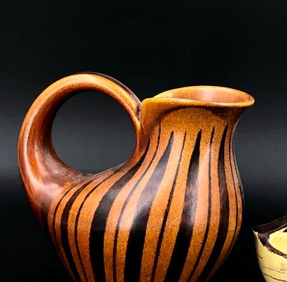 null BAY KERAMIK and others
Set including a glazed ceramic water pot with brown stripes...