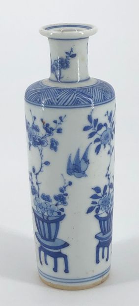 null White porcelain scroll vase with blue underglaze decoration of flowering planters,...