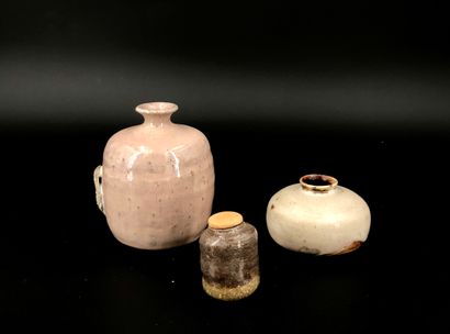 null Three stonewares, including a small grey stoneware cha-ire with a shaded brown...