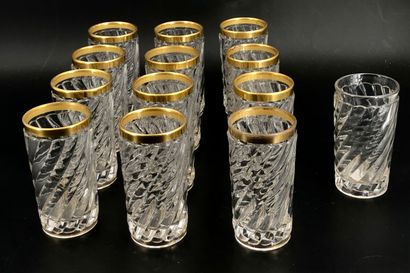 null BACCARAT
Suite de 12 verres en verre moulé torsadé à bordure dorée, marqués...