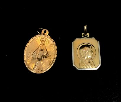 null Deux médailles religieuses en or jaune 18K. 750 °/°° 
Poids : 2,3 g.
Chocs