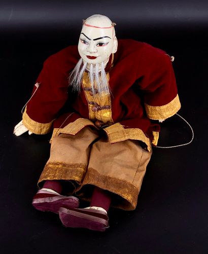 null INDONESIE 
Marionette en composition et tissu 
H. : 47 cm