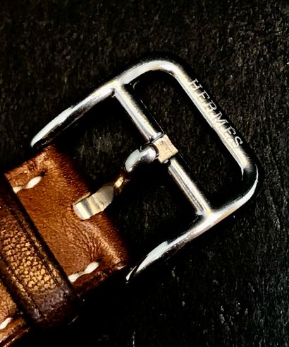null HERMES Paris. 
Modèle "Arceau"
Montre bracelet de dame (diam cadran:300mm) à...