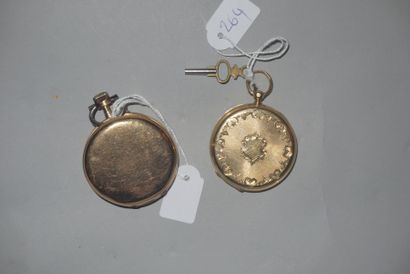 null Deux montres en or dont une à ancre, l'autre à cylindre. Pb. 121.8gr