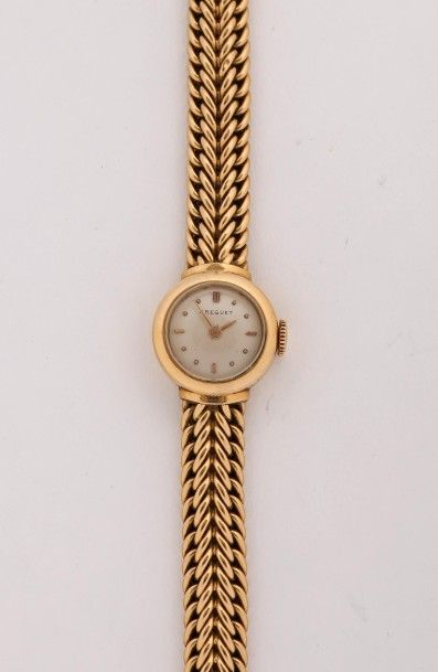 BREGUET Montre de dame en or (pb. 24.9gr), cadran satiné, bracelet tressé.