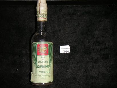 L.T. Piver «Givrine». Flacon cylindrique en verre incolore destiné à contenir l'Eau...