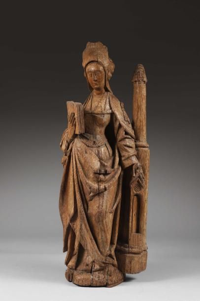 null Sainte Barbe en chêne sculpté avec infimes traces de polychromie en ronde-bosse....