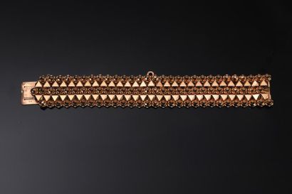 null Bracelet manchette en or 18K (750°/00) à motifs de billes facettées et de pointes...