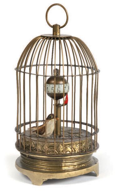 null Pendulette 'L'oiseau dans sa cage'.H. 14, 7 cm.