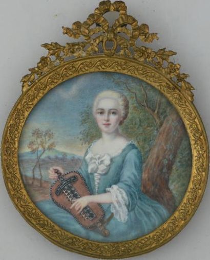 Ecole française. Une dame de qualité jouant sur une vielle à roue dans un paysage....