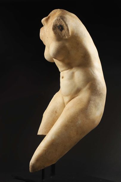 null Torse de Vénus

Figurée nue, inclinée vers l’avant.

Marbre blanc

Art Romain,...