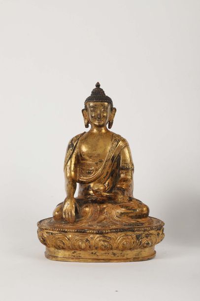 null Buddha en métal doré

H. 20 cm