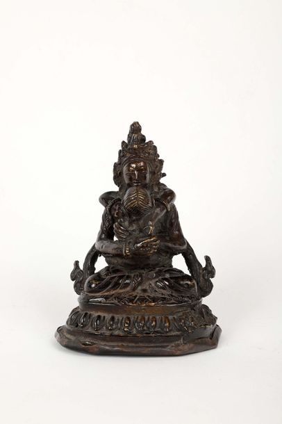 null Buddha ou scène de kamasutra

Bronze et métal, travail probablement indien,...