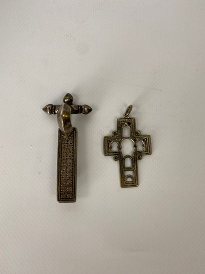 An openwork cross pendant in foreign silver,...
