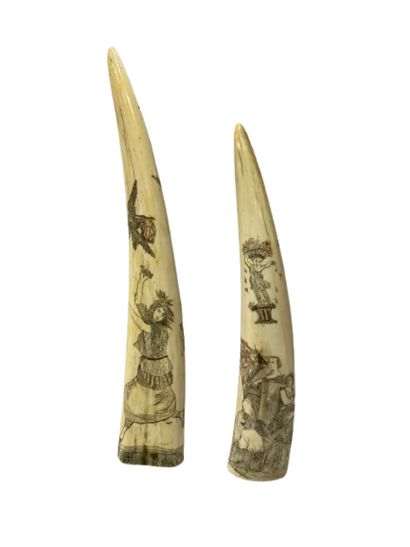 Two walrus tooth scrimshaws, with a theme...