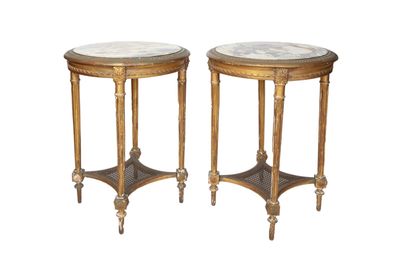  Pair of pedestal tables in stuccoed and gilded wood, the uprights in fluted columns...