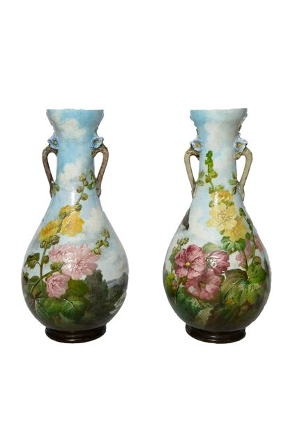 Important pair of enamelled ceramic vases...
