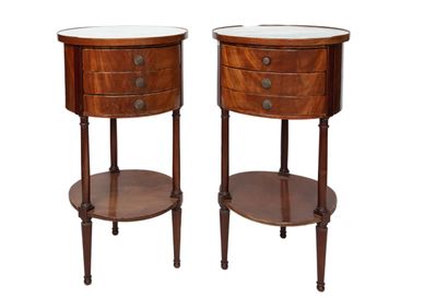  A pair of mahogany and mahogany veneer tambour tables, opening with three drawers...