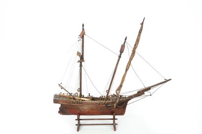 Two models of three-masted wooden boats....