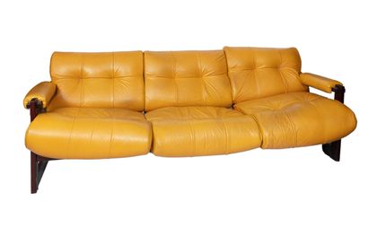  Percival LAFER (born 1936) Three seater sofa in yellow leather and wood. Label (damaged)...