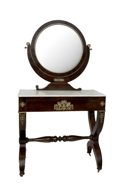 Mahogany and mahogany veneer psyche, the round mahogany mirror supported by a grey...