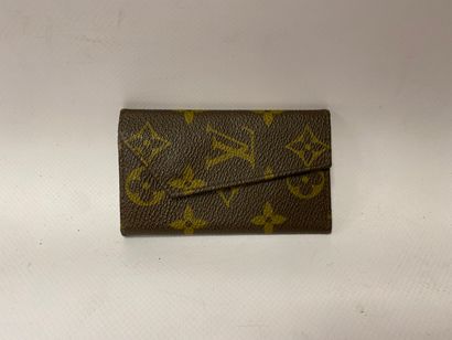 LOUIS VUITTON a key ring in monogrammed canvas...