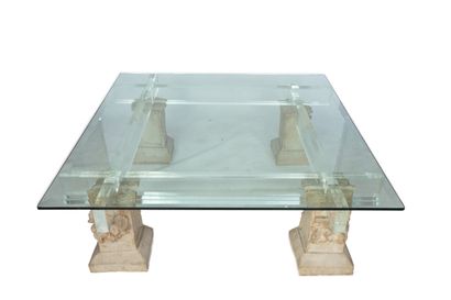  Coffee table in composite material and bevelled glass top. Four legs in composite...