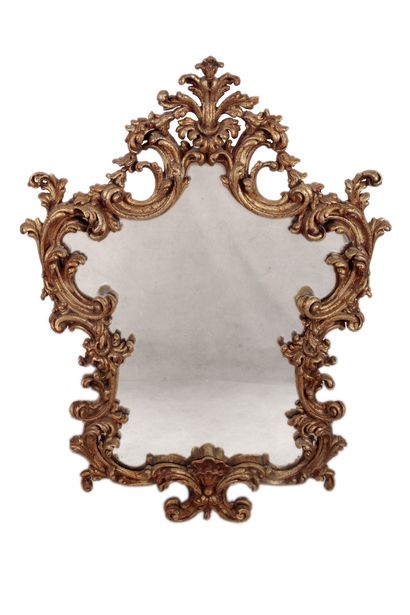 Grand miroir de forme mouvementée en bois...