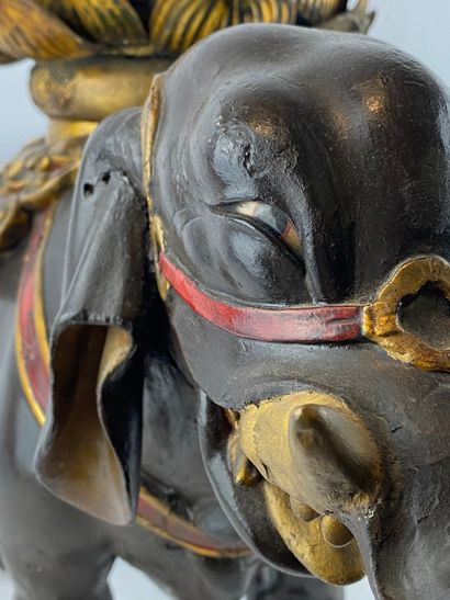  Carved wood subject with polychrome gilded lacquer representing a South-East Asian...