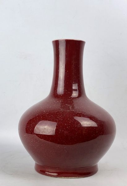 Porcelain stoneware vase with oxblood glaze,...