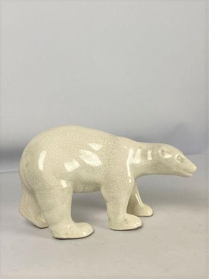  Sujet en faïence craquelée émaillée beige figurant un ours polaire 16 x 26 cm