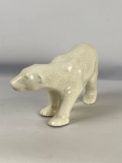  Sujet en faïence craquelée émaillée beige figurant un ours polaire 16 x 26 cm
